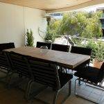 Al fresco dining for eight at Sun, sand, sea and salty kisses Cottesloe holiday accommodation