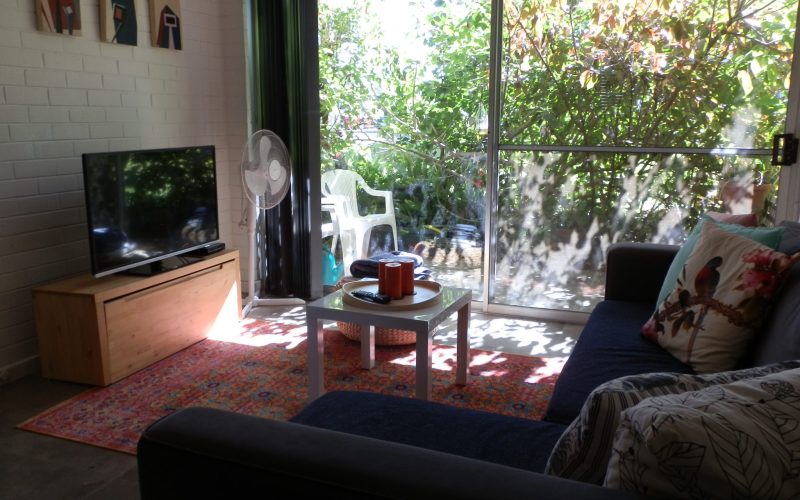 A comfy spot to watch tv at Three on Whatley