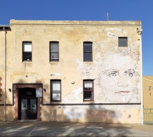 Faces in building facades on Norfolk street Fremantle