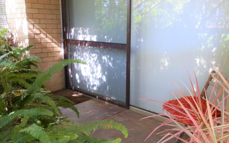 sunny porch at Four on Whatley