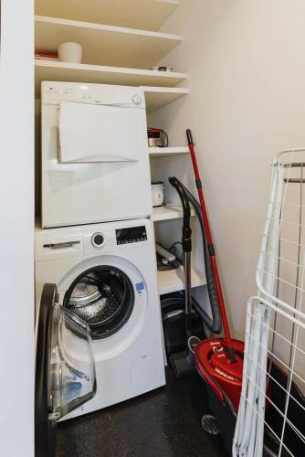 Washer, Dryer, Vacuum, Mop, Clothes horse, Ironing board and iron - all you need for a longer stay in the Architect's Warehouse Apartment Fremantle